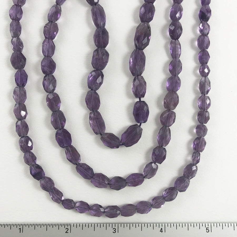 Amethyst Faceted Flat oval Bead Strand (AME-G038)
